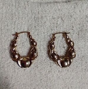 Goldtone puffy decorative wire earrings